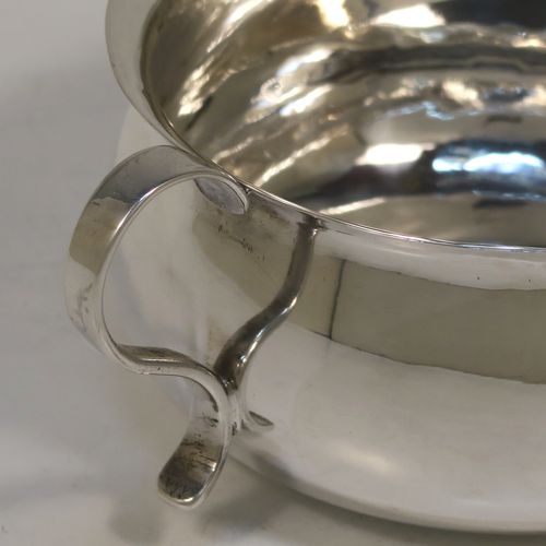 A very unusual Antique Victorian Sterling Silver copy of a bedchamber pot, having a plain bellied body, and a scroll side-handle. This handsome antique silver bedchamber pot bowl was made by Lamberts of London in 1890. The dimensions of this fine hand-made antique silver chamber pot are diameter 11 cms (4.25 inches), height 6 cms (2.3 inches), and it weighs approx. 140g (4.5 troy ounces).  