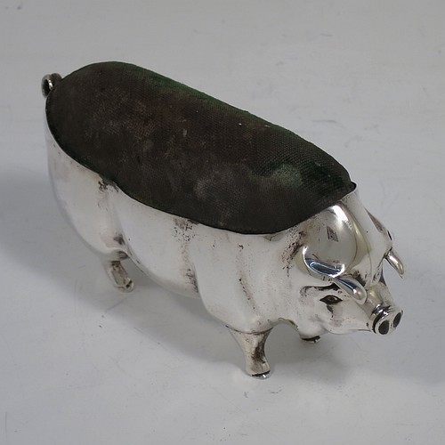 A handsome and unusually large Antique Edwardian Sterling Silver pin cushion, in the form of a pig with a dark green velvet covered pin cushion along its back. Made by Levi and Salaman of Birmingham in 1903. The dimensions of this fine hand-made antique silver Pig pin cushion are length 6 cms (2.3 inches), width 3 cms (1.25 inches), an height 5.5 cms (2.25 inches). Please note that the green velvet is discoloured.     