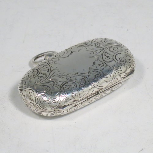 An Antique Edwardian Sterling Silver double Sovereign case, having a rectangular body with rounded corners and hand-engraved floral decoration, with a hinged lid, and internal sprung mechanisms which are in working order, and a push-button clasp with ring. All made by Samuel M. Levi of Birmingham in 1909. The dimensions of this fine hand-made antique silver sovereign case are length 6 cms (2.3 inches), width 3.5 cms (1.3 inches), and it weighs 36g (1.2 troy ounces).   