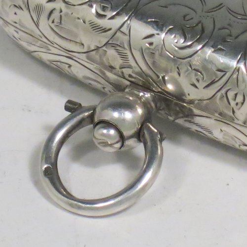 An Antique Edwardian Sterling Silver double Sovereign case, having a rectangular body with rounded corners and hand-engraved floral decoration, with a hinged lid, and internal sprung mechanisms which are in working order, and a push-button clasp with ring. All made by Samuel M. Levi of Birmingham in 1909. The dimensions of this fine hand-made antique silver sovereign case are length 6 cms (2.3 inches), width 3.5 cms (1.3 inches), and it weighs 36g (1.2 troy ounces).   