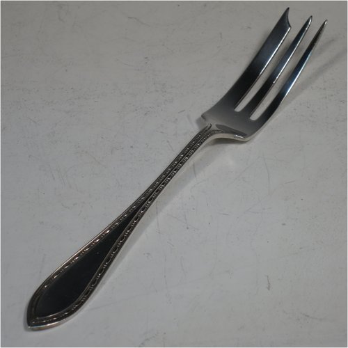 A Sterling Set of six pastry forks, having single-struck bead and pearl handles, and three tined forks, all in their original satin and velvet-lined presentation box. Made by Suckling Ltd., of Birmingham in 1925. The dimensions of these fine hand-made silver pastry forks are length 12.5 cms (5 inches), and they weigh a total of 99g (3.2 troy ounces). Please note that the interior satin lining is damaged and the exterior of the box has worn corners.