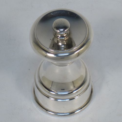 An Antique Victorian Sterling Silver pepper grinder, having a plain round baluster body, an original Peugeot grinder mechanism, and a knurled finial. Made by Mitchell Bosley of Birmingham in 1899. The dimensions of this fine hand-made antique silver pepper grinder are height 9 cms (3.5 inches), diameter at base 4.5 cms (1.75 inches), and it weighs approx. 96g (3 troy ounces).  