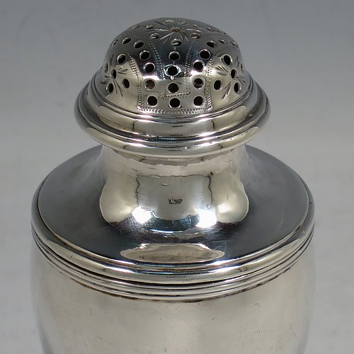 An Antique Georgian George III Sterling Silver bun style pepper pot, having a plain round body with applied reeded borders, a hand-pierced pull-off domed lid, and sitting on a pedestal foot. Made by Henry Green of London in 1794. The dimensions of this fine hand-made antique silver pepper pot are height 13 cms (5 inches), diameter of main body 5 cms (2 inches), and it weighs approx. 164g (5.3 troy ounces).    