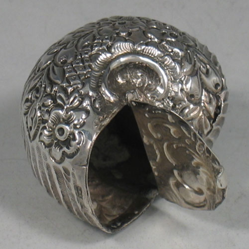 Antique Victorian sterling silver hand-chased snail pillbox made in Sheffield, 1898. Length 5 cms.