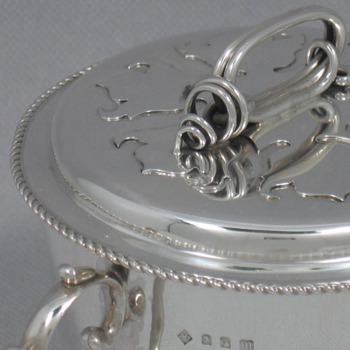    Antique Edwardian Britannia standard silver two-handled porringer with lid, made in London in 1907. Diameter 12 cms, height 12 cms. Weight approx. 15 troy ounces.