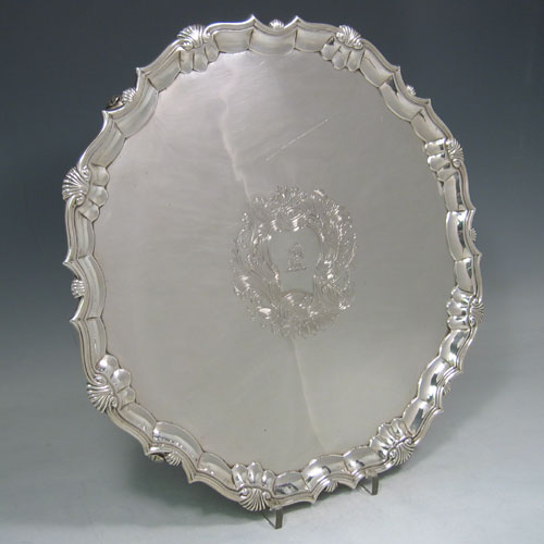    Antique Georgian sterling silver salver made by Robert Abercrombie of London in 1744. Diameter 36 cms. (Crested).