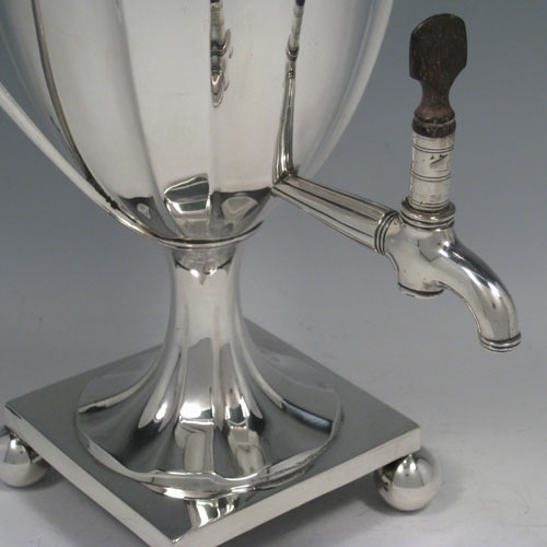 Antique Georgian sterling silver urn-style samovar with lift-off lid and spigot. Made by Charles Adams of London in 1790. Please note that there is no mechanism for heating, and the body is crested above the spigot. The dimensions of this sterling silver samovar are height 40 cms (15.75 inches), width 24 cms (9.5 inches). Weight approx. 48 troy ounces.