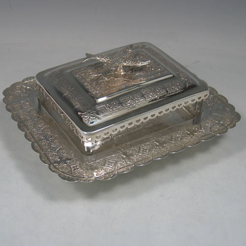    Antique Victorian silver-plated and glass sardine dish, made by James Dixon and Sons circa 1870. Length 13 cms, width 17 cms. (glass liner).