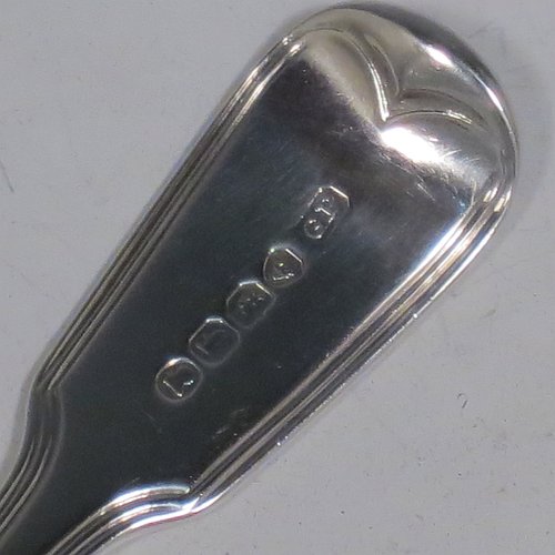 An Antique Georgian Sterling Silver pair of Sauce Ladles in the double-struck Fiddle & Thread pattern. Made by George Piercy of London in 1821. The dimensions of this fine pair of hand-made antique silver sauce ladles are length 17 cms (6.75 inches), and they weigh a total of approx. 140g (4.5 troy ounces). Please note that these items are crested.   