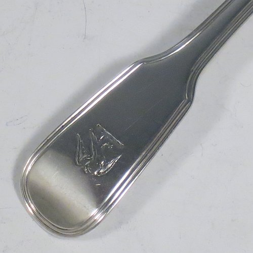 An Antique Georgian Sterling Silver pair of Sauce Ladles in the double-struck Fiddle & Thread pattern. Made by George Piercy of London in 1821. The dimensions of this fine pair of hand-made antique silver sauce ladles are length 17 cms (6.75 inches), and they weigh a total of approx. 140g (4.5 troy ounces). Please note that these items are crested.   