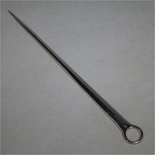 An Antique Georgian Sterling Silver meat or game bird skewer, having a very plain tapering body with ring handle. Made by Richard Crossley of London in 1794. The dimensions of this fine hand-made antique silver game bird or meat skewer are length 29 cms (11.5 inches), and it weighs approx. 98g (3 troy ounces). Please note that this item is in original condition with a crest and it still has the old scratch marks from using a carving knife.    