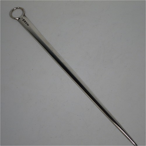 An Antique Georgian Sterling Silver meat or game bird skewer, having a very plain tapering body with ring handle. Made by Eley and Fern of London in 1802. The dimensions of this fine hand-made antique silver game bird or meat skewer are length 33 cms (13 inches), and it weighs approx. 102g (3.3 troy ounces).    