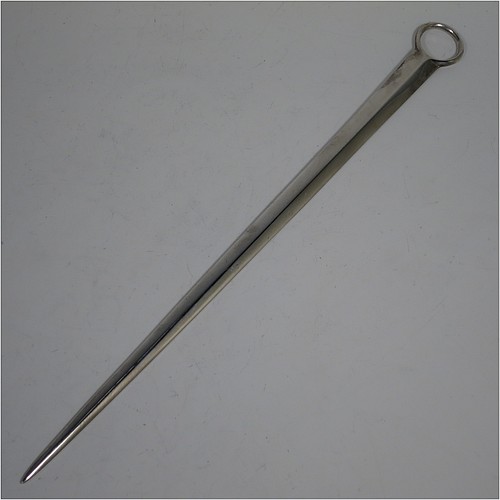 An Antique Georgian Sterling Silver meat or game bird skewer, having a very plain tapering body with ring handle. Made by Eley and Fern of London in 1802. The dimensions of this fine hand-made antique silver game bird or meat skewer are length 33 cms (13 inches), and it weighs approx. 102g (3.3 troy ounces).    