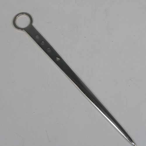 An elegant Sterling Silver meat or game bird skewer, having a very plain tapering body with a ring handle. This beautiful sterling silver skewer was made by J. A. Campbell of London in 1988. The dimensions of this fine hand-made silver game bird or meat skewer are length 21 cms (8.25 inches), and it weighs approx. 55g (1.8 troy ounces).  