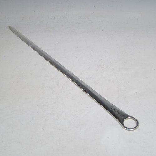 Antique Georgian Sterling silver meat or game bird skewer, having a very plain tapering body with ring handle. Made by Peter & William Bateman of London in 1808. The dimensions of this fine hand-made silver game bird or meat skewer are length 33 cms (13 inches), and it weighs approx. 97g (3 troy ounces).   