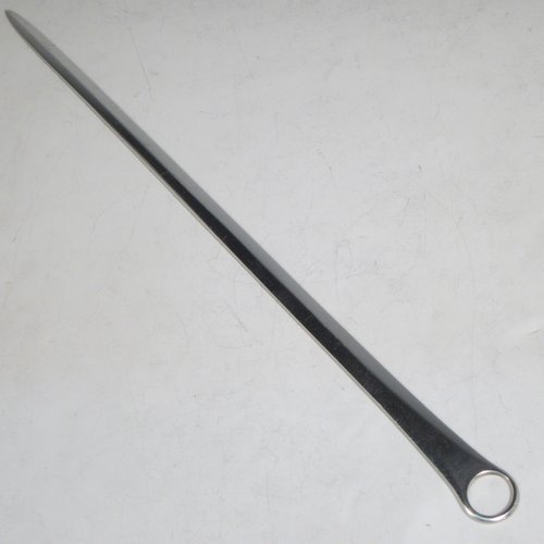 Antique Georgian Sterling silver meat or game bird skewer, having a very plain tapering body with ring handle. Made by Peter & William Bateman of London in 1808. The dimensions of this fine hand-made silver game bird or meat skewer are length 33 cms (13 inches), and it weighs approx. 97g (3 troy ounces).   