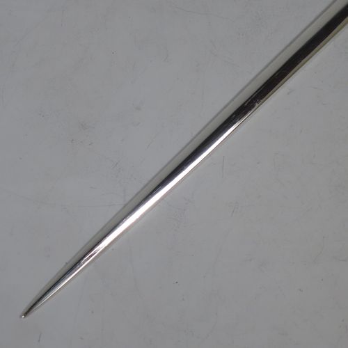 A handsome Antique Georgian Sterling Silver meat or game bird skewer, having a very plain tapering body with a ring handle. Made by Smith and Fern of London in 1787. The dimensions of this fine hand-made antique silver game bird or meat skewer are length 28 cms (11 inches), and it weighs approx. 70g (2.3 troy ounces).    