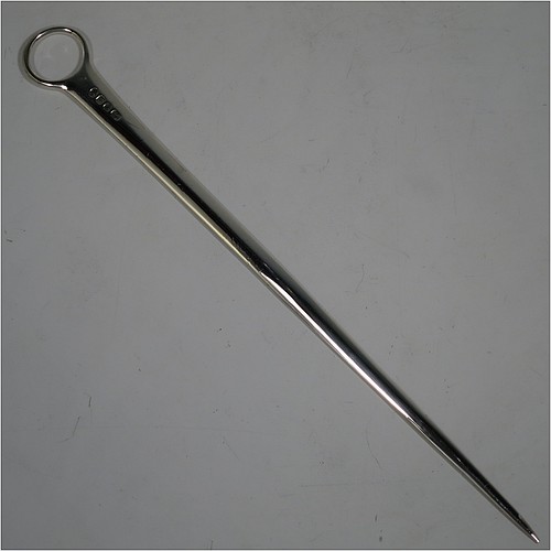 A very handsome Antique Georgian Sterling Silver meat or game bird skewer, having a very plain tapering body with a plain ring handle. Made in London in 1776. The dimensions of this fine hand-made antique silver game bird or meat skewer are length 27 cms (10.5 inches), and it weighs approx. 46g (1.5 troy ounces). Please note that this item is crested.   