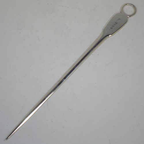 A handsome Antique Georgian Sterling Silver meat or game bird skewer in the Fiddle pattern, having a very plain tapering body with Fiddle shoulders and a ring handle. Made by William Bateman of London in 1830. The dimensions of this fine hand-made antique silver game bird or meat skewer are length 30.5 cms (12 inches), and it weighs approx. 87g (2.8 troy ounces).   