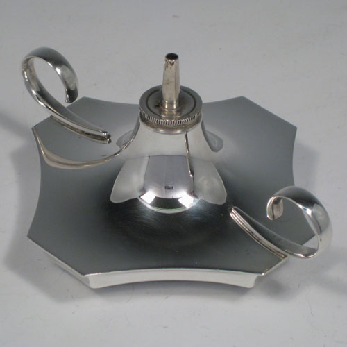    Sterling silver hand-made wick style table lighter with scroll handles, made by Hukin & Heath of Birmingham in 1936. Length 12 cms (4.75 inches), width 10 cms (4 inches), height 6.5 cms (2.5 inches). Weight approx. 3.5 troy ounces (109g).