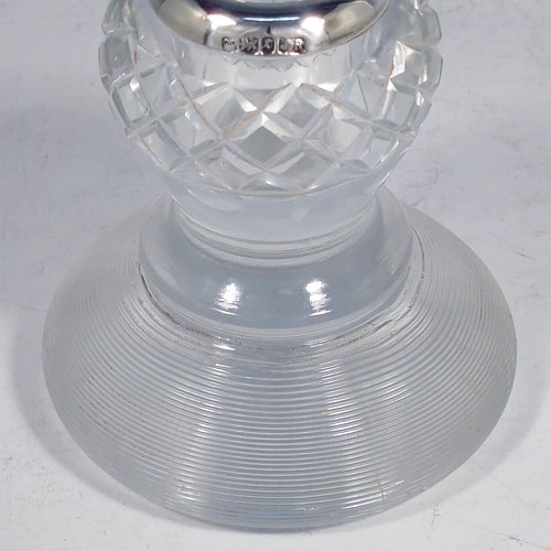 An Antique Victorian Sterling Silver and crystal match holder and striker, having a a very unusual round baluster body, with a silver rim around the match holder, a hand-cut hobnail pattern upper body and a lower ridged body for striking the matches. Made by James Round of Sheffield in 1895. The dimensions of this fine hand-made antique silver and crystal match striker are diameter 8.5 cms (3.3 inches), and height 9.5 cms (3.75 inches).   