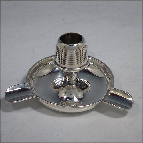 An Antique Edwardian Sterling Silver combination  match holder, striker, and ash-tray, having a plain round body, with three cigarette holders, and a central match holder with sloping striker sides, and all sitting on a flat base. Made by Charles Cooke of Chester in 1902. The dimensions of this fine hand-made antique silver match striker and ash-tray are diameter 7.5 cms (3 inches), height 6 cms (2.3 inches), and it weighs approx. 60g (2 troy ounces).  