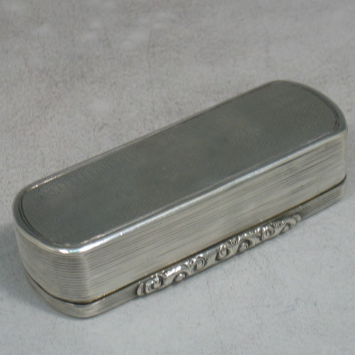 Antique Early Victorian sterling silver and gold-gilt snuff box made by Edward Smith of Birmingham in 1838 (Engraved inside with a contemporaneous inscription). Length 9 cms, width 3 cms.