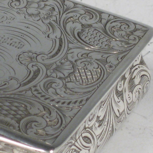 Antique Victorian sterling silver snuff box, having a rectangular body with hand-engraved floral decoration, a hinged lid with thumb-pieces, and a gold-gilt interior. Made by Taylor and Perry of London in 1847. The dimensions of this fine hand-made silver snuff box are length 10 cms (4 inches), width 5.7 cms (2.25 inches), height 2.5 cms (1 inch), and it weighs approx. 147g (4.7 troy ounces). Please note that this item is engraved with a full contemporaneous presentation inscription.