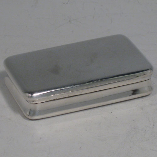    Antique Georgian sterling silver snuff box, having a very plain body, with gold-gilt interior, and hinged lid. Made by Alexander J. Strahan of London in 1804. Length 7.5 cms (3 inches), width 4.5 cms (1.75 inches). Weight approx. 58g (1.9 troy ounces).