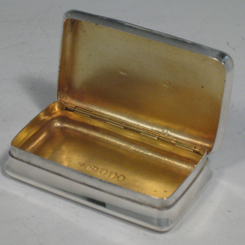    Antique Georgian sterling silver snuff box, having a very plain body, with gold-gilt interior, and hinged lid. Made by Alexander J. Strahan of London in 1804. Length 7.5 cms (3 inches), width 4.5 cms (1.75 inches). Weight approx. 58g (1.9 troy ounces).