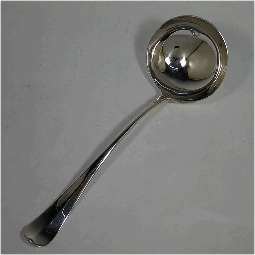 A very handsome Antique Edwardian Sterling Silver soup ladle in the Hanoverian Rattail pattern, having a plain handle with ridge and pip, and plain bowl with rattail on reverse. Made by Charles William Fletcher of Sheffield in 1905. The dimensions of this fine hand-made antique silver soup ladle are length 30 cms (11.75 inches), and it weighs approx. 251g (8 troy ounces).    