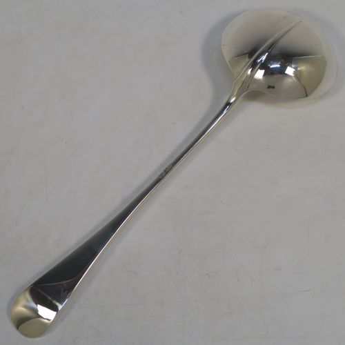 A very elegant Antique Sterling Silver soup ladle in the Rattail pattern, with a plain round bowl. This beautiful antique silver soup ladle was made by George Hancock of Sheffield in 1917. The dimensions of this fine hand-made antique silver soup ladle are length 31.5 cms (12.3 inches), and it weighs approx. 234g (7.5 troy ounces).   