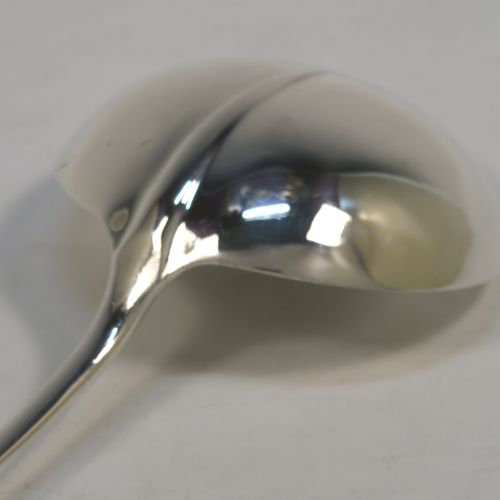 A very elegant Antique Sterling Silver soup ladle in the Rattail pattern, with a plain round bowl. This beautiful antique silver soup ladle was made by George Hancock of Sheffield in 1917. The dimensions of this fine hand-made antique silver soup ladle are length 31.5 cms (12.3 inches), and it weighs approx. 234g (7.5 troy ounces).   