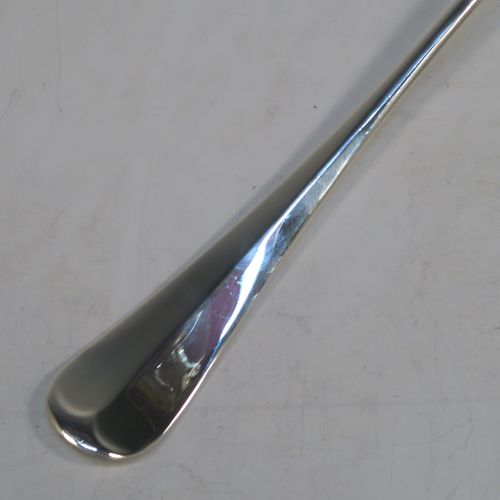 A very elegant Antique Sterling Silver soup ladle in the Rattail pattern, with a plain round bowl. This beautiful antique silver soup ladle was made by George Hancock of Sheffield in 1917. The dimensions of this fine hand-made antique silver soup ladle are length 31.5 cms (12.3 inches), and it weighs approx. 234g (7.5 troy ounces).   