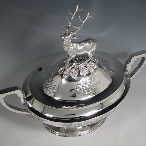 Antique Victorian silver plated soup tureen, having a pull-off lid with a cast model of a stag, with hand-chased floral decoration, applied bead-edged borders, two scroll side-handles, and all sitting on a pedestal foot. Made in ca. 1870. The dimensions of this fine hand-made silver-plated soup tureen and cover are height 33 cms (13 inches), length including handles 37 cms (14.5 inches), and width 20 cms (8 inches).   