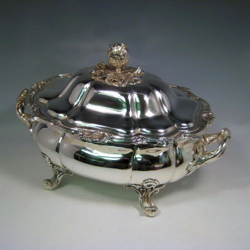 Antique Victorian silver plated soup tureen with pull-off lid, melon-style fluted body, cast floral and shell borders, and cast floral handles and feet. Made by G.R. Collis & Co., in ca. 1870. Height 26 cms (10.25 inches), length including handles 41 cms (16 inches), width 27 cms (10.5 inches). 