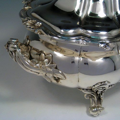 Antique Victorian silver plated soup tureen with pull-off lid, melon-style fluted body, cast floral and shell borders, and cast floral handles and feet. Made by G.R. Collis & Co., in ca. 1870. Height 26 cms (10.25 inches), length including handles 41 cms (16 inches), width 27 cms (10.5 inches). 