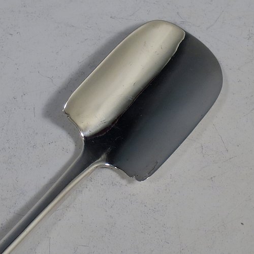 An Antique Georgian Sterling Silver and bone handled stilton cheese scoop, having a hand-cut handle, a hand-chased reeded ferrule, and a plain rounded cross-section stem with robust scoop. Made by Joseph Willmore of Birmingham in 1805. The dimensions of this fine hand-made antique silver and bone stilton cheese scoop are length 23.5 cms (9.25 inches).    