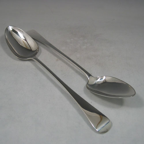    Antique Georgian sterling silver pair of Old Englaish pattern stuffing spoons made by James Beebe of London in 1814. Length 30 cms, approx. weight 6 troy ounces. 