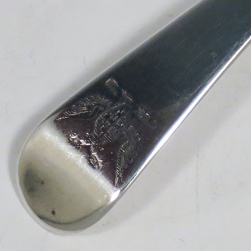 An Antique Georgian Sterling Silver Old English pattern stuffing spoon, having a very plain handle with pip on reverse, and a plain oval bowl. Made by George Smith III & William Fearn of London in 1787. The dimensions of this fine hand-made antique silver stuffing spoon are length 30 cms (11.75 inches), and it weighs approx. 120g (3.9 troy ounces). Please note that this item is crested.