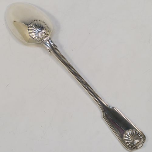 A handsome Antique Sterling Silver stuffing spoon in the double-struck Fiddle, Thread, and Shell patKings pattern. This beautiful antique silver stuffing or basting spoon was made by Francis Higgins of London in 1912. The dimensions of this fine hand-made silver stuffing spoon are length 30.5 cms (12 inches), and it weighs approx. 209g (6.7 troy ounces).  