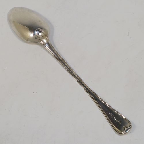 A handsome Antique Victorian Sterling Silver stuffing spoon in the double-struck Old English and Thread pattern. This elegant antique silver spoon was made by George Adams of London in 1848. The dimensions of this fine hand-made antique silver stuffing spoon are length 30.5 cms (12 inches), and it weighs approx. 150g (4.8 troy ounces).   