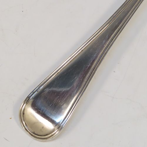 A handsome Antique Victorian Sterling Silver stuffing spoon in the double-struck Old English and Thread pattern. This elegant antique silver spoon was made by George Adams of London in 1848. The dimensions of this fine hand-made antique silver stuffing spoon are length 30.5 cms (12 inches), and it weighs approx. 150g (4.8 troy ounces).   