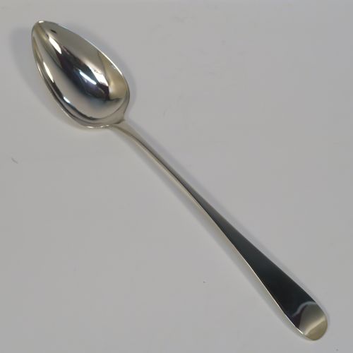 A handsome Antique Georgian Sterling Silver Old English pattern stuffing spoon, having a very plain handle with pip on reverse, and a plain oval bowl. This elegant silver serving spoon was made by George Ferris of Exeter in 1813. The dimensions of this fine hand-made antique silver stuffing spoon are length 30 cms (11.75 inches), and it weighs approx. 82g (2.6 troy ounces).   