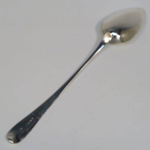 A handsome Antique Georgian Sterling Silver Old English pattern stuffing spoon, having a very plain handle with pip on reverse, and a plain oval bowl. This elegant silver serving spoon was made by George Ferris of Exeter in 1813. The dimensions of this fine hand-made antique silver stuffing spoon are length 30 cms (11.75 inches), and it weighs approx. 82g (2.6 troy ounces).   