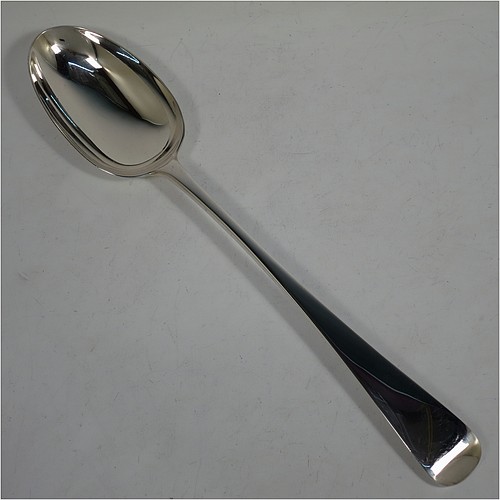 An Antique Edwardian Sterling Silver heavy stuffing spoon in the Old English pattern, having a very plain handle with pip on reverse, and a plain oval bowl. Made by Jackson and Fullerton of London in 1907. The dimensions of this fine hand-made antique silver stuffing spoon are length 31 cms (12.25 inches), and it weighs approx. 156g (5 troy ounces).    