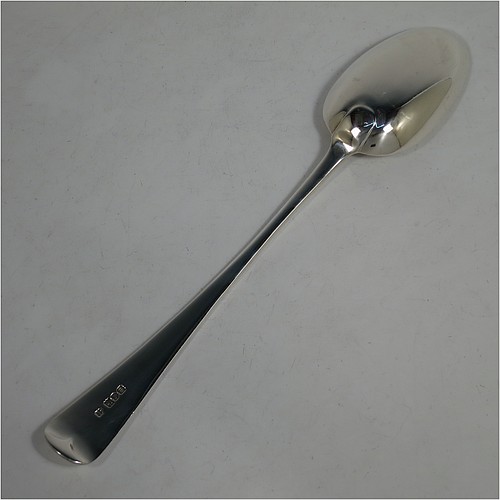 An Antique Edwardian Sterling Silver heavy stuffing spoon in the Old English pattern, having a very plain handle with pip on reverse, and a plain oval bowl. Made by Jackson and Fullerton of London in 1907. The dimensions of this fine hand-made antique silver stuffing spoon are length 31 cms (12.25 inches), and it weighs approx. 156g (5 troy ounces).    