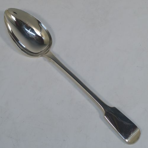 A handsome Antique early Victorian Sterling Silver Fiddle pattern stuffing spoon, having a very plain handle with pip on reverse, and a plain oval bowl with shoulders above. This elegant antique silver spoon was made by Charles Boyton I of London in 1837. The dimensions of this fine hand-made antique silver stuffing spoon are length 30 cms (11.75 inches), and it weighs approx. 96g (3 troy ounces).   