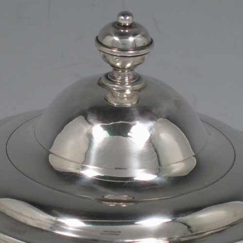 Antique Georgian sterling silver covered sugar or sweetmeat bowl, having a plain round baluster body, applied reeded borders, a pull-off lid with finial, and sitting on a pedestal foot. Made by William Cafe of London in 1761. The dimensions of this fine hand-made silver covered sugar / sweetmeat bowl are height 15 cms (6 inches), diameter 11 cms (4.25 inches), and it has a total weight of approx. 331g (10.7 troy ounces).   