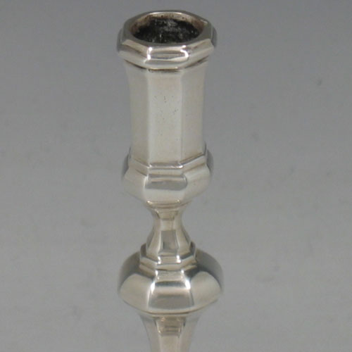 Antique Victorian cast sterling silver taper-stick made by Turner Bradbury of London in 1895. Height 11 cms. Weight 4 troy ounces.